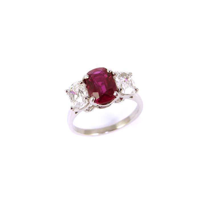 Three stone cushion cut Burma ruby and diamond ring